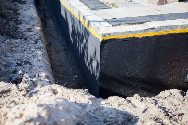 Professional Waterproofing technician working in Lynnville, IN